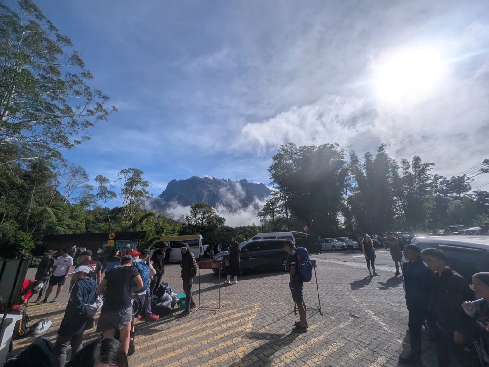Climbers gathering at the Park HQ, Mt. Kinabalu in the background